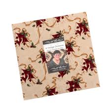 Floral-patterned Christmas fabric with a Moda label on a beige background