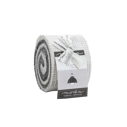 Roll of fabric with metallic silver , charcoal, and white colours