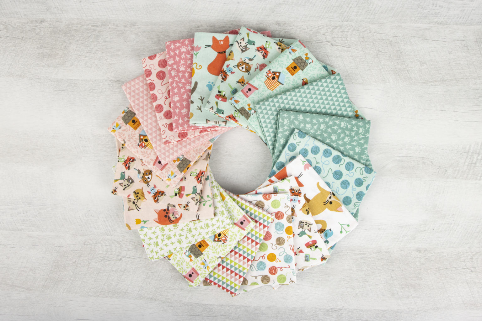 Riley Blake Cat's Meow fabrics in a circular design showing the collection