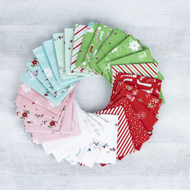 Pixie Noel 2 Fat Quarter Bundle with festive pixies, reindeer, florals and retro holiday prints in soft Christmas colours for quilting and sewing.