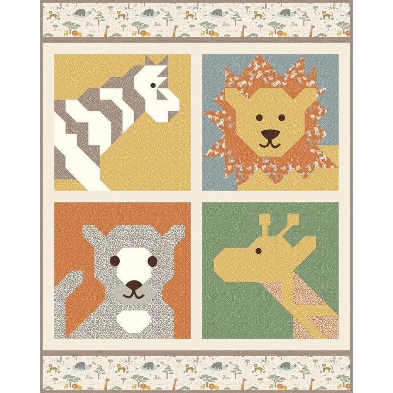 Safari animal boxed quilt top with four square prints in orange, green, cream