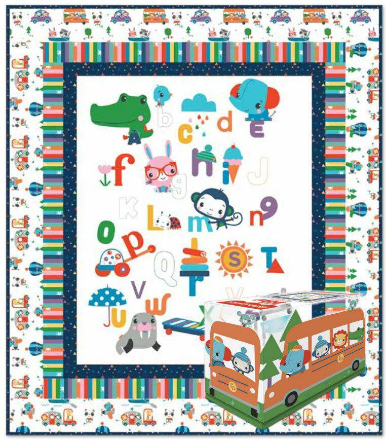 Children's quilt panel with trains, animals, and colorful alphabet letters