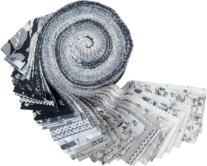Collection of fabric strips in monochrome tones in various patterns and colors on a white background