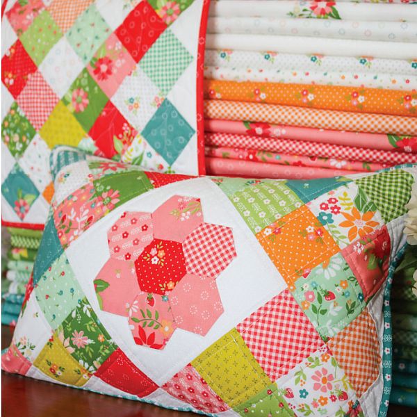 Multicolor patchwork quilted pillow with circular floral design