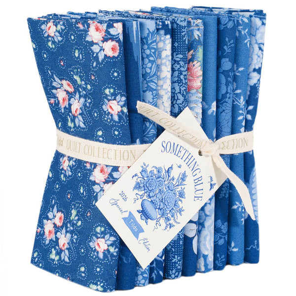 Blue floral fat quarter fabric bundle, folded squares tied with ribbon