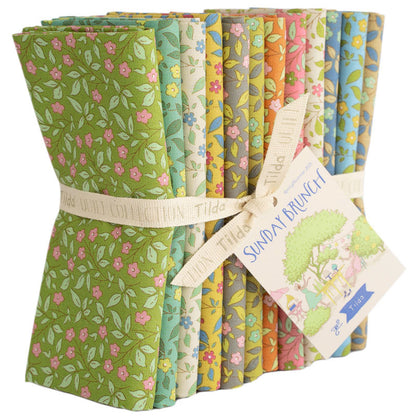 Floral fat quarter fabric bundle with green, blue, pink, and orange blenders