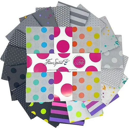 tula pink graywork true colors layer cake with black and white prints featuring bold patterns and modern designs